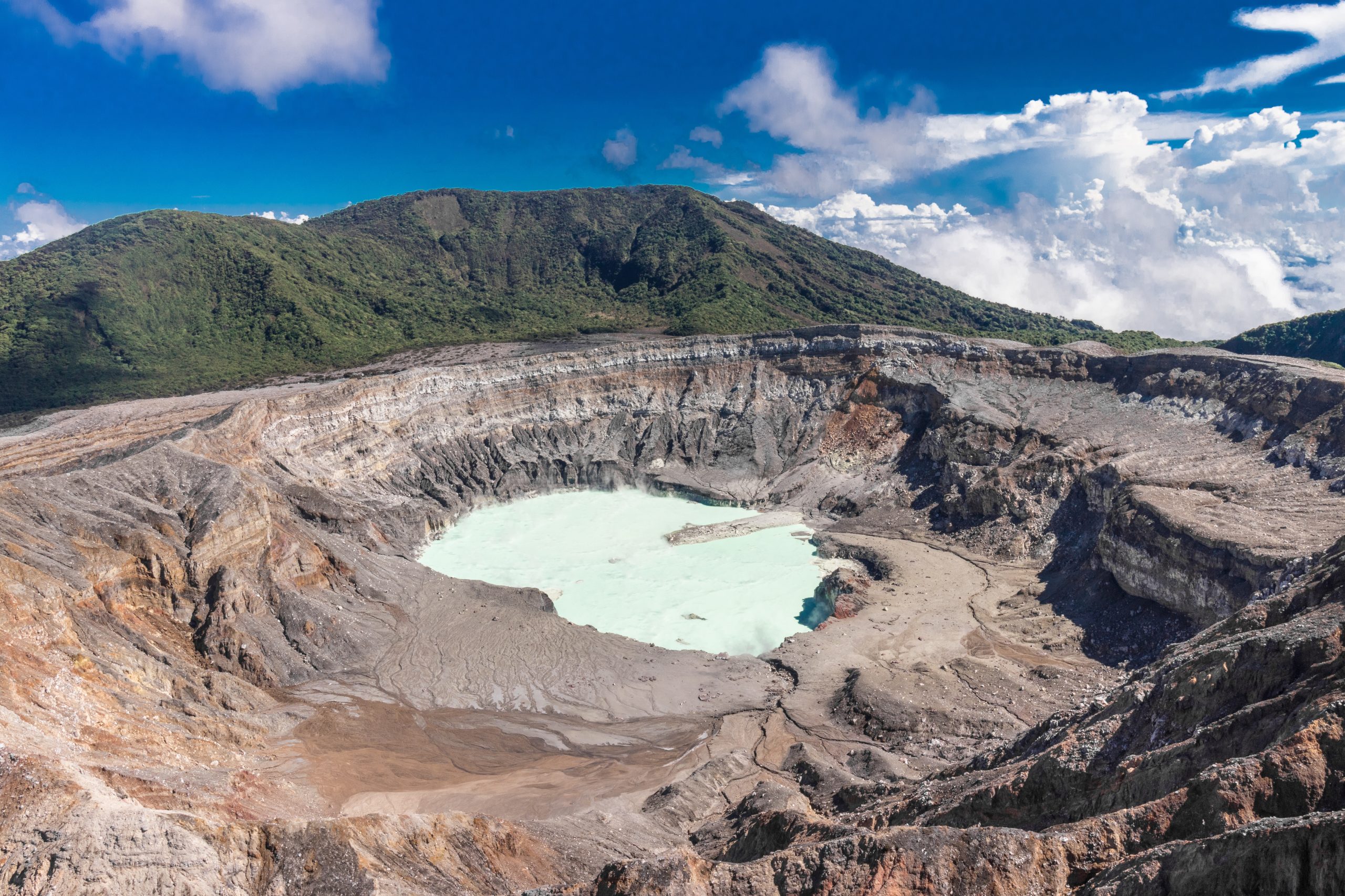 Panoramic,Shot,Of,The,Crater,With,Turquoise,Acidic,Waters,In