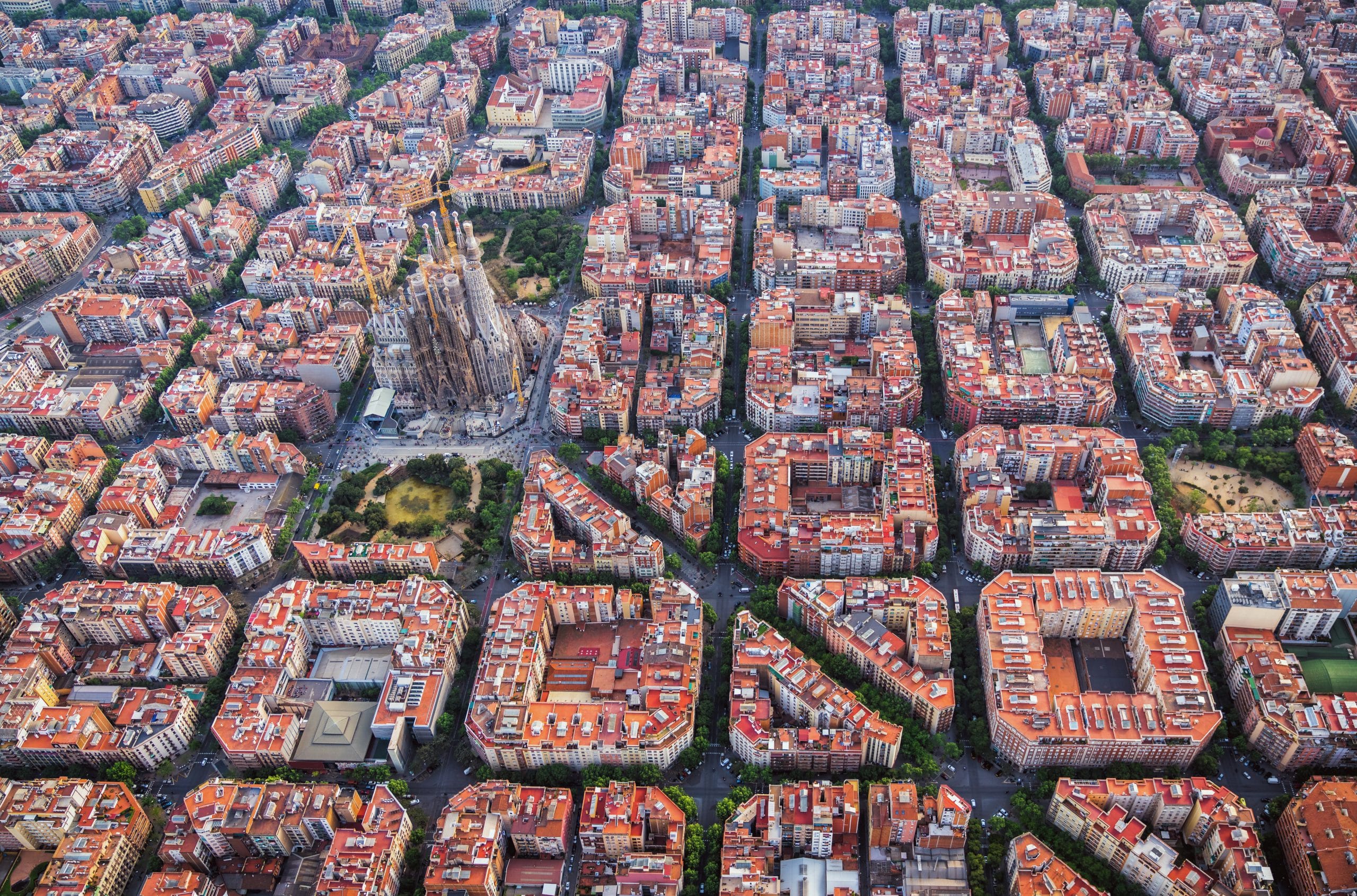 Aerial,View,Of,Barcelona,Eixample,Residencial,District,And,Famous,Basilica,