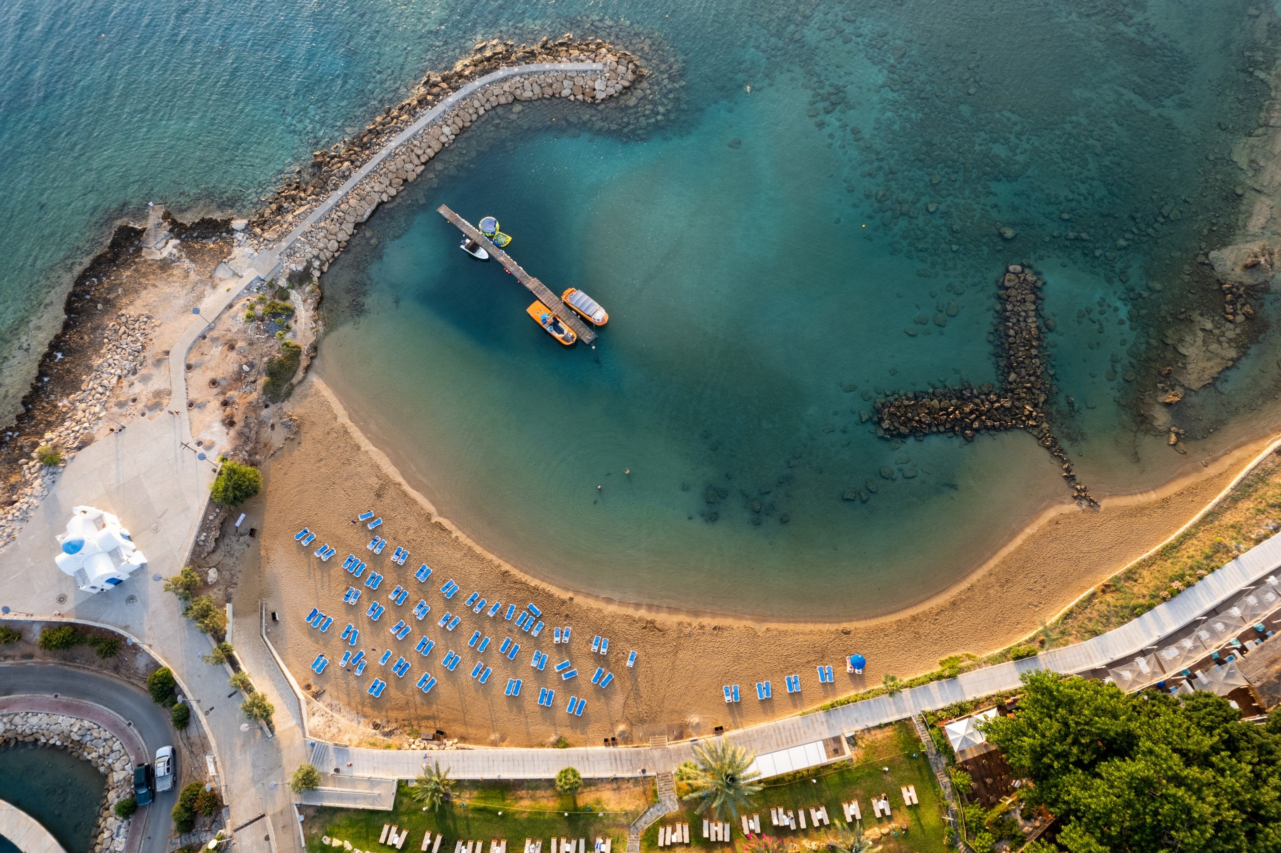 Drone,Aerial,Of,Tropical,Sandy,Beach.,Beach,Umbrellas,People,Swimming