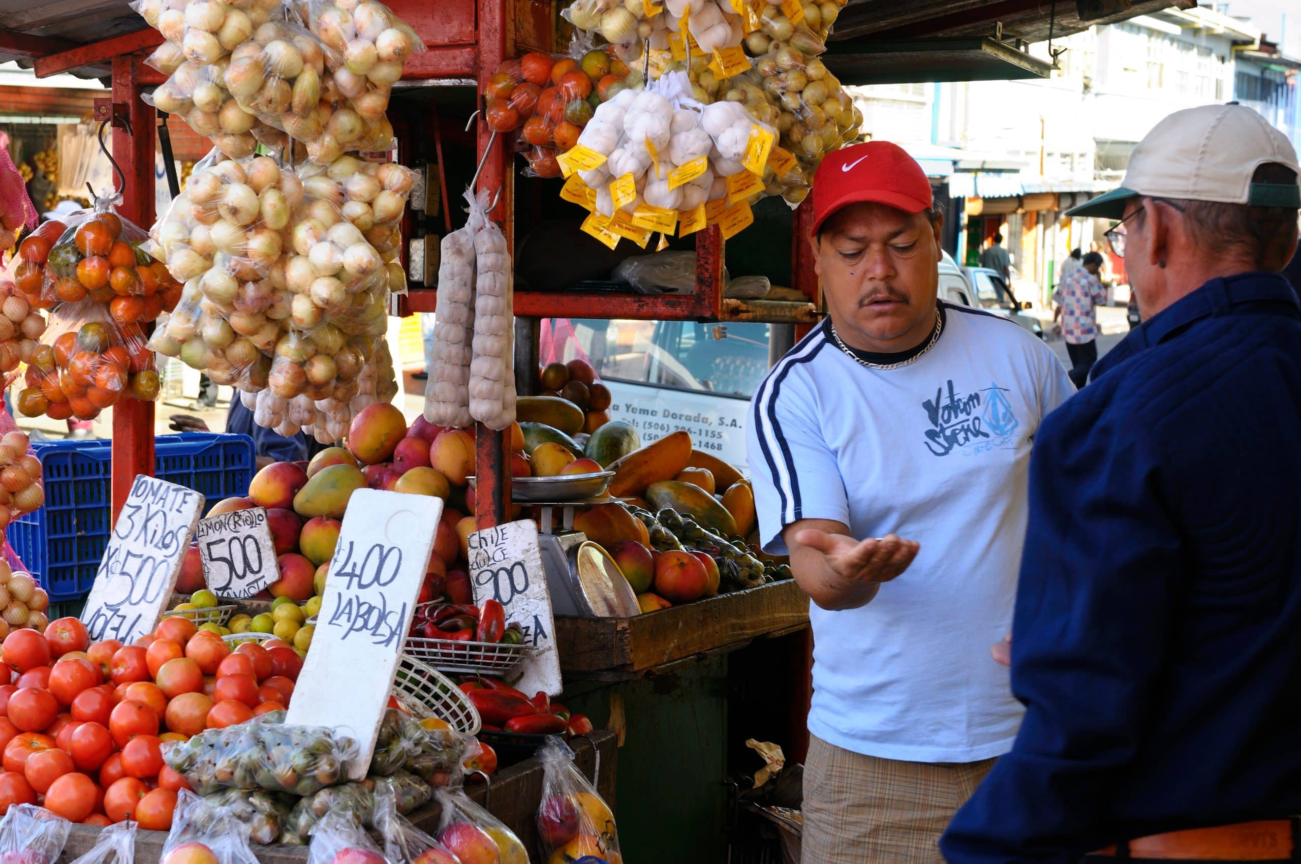 Counting,Change,At,A,San,Jose,Costa,Rica,Street,Side